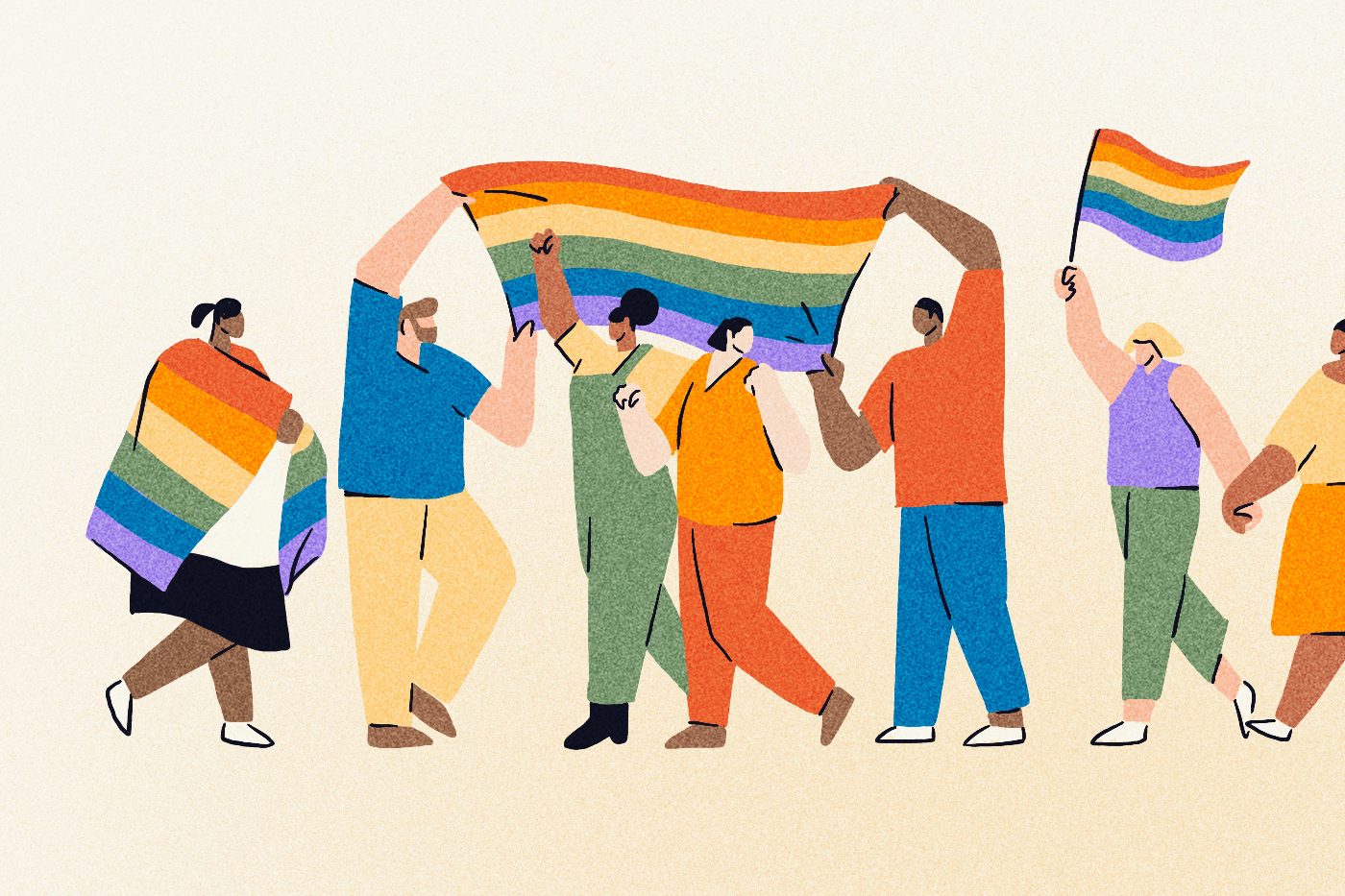 Group of diverse individuals walking in a parade with rainbow flags