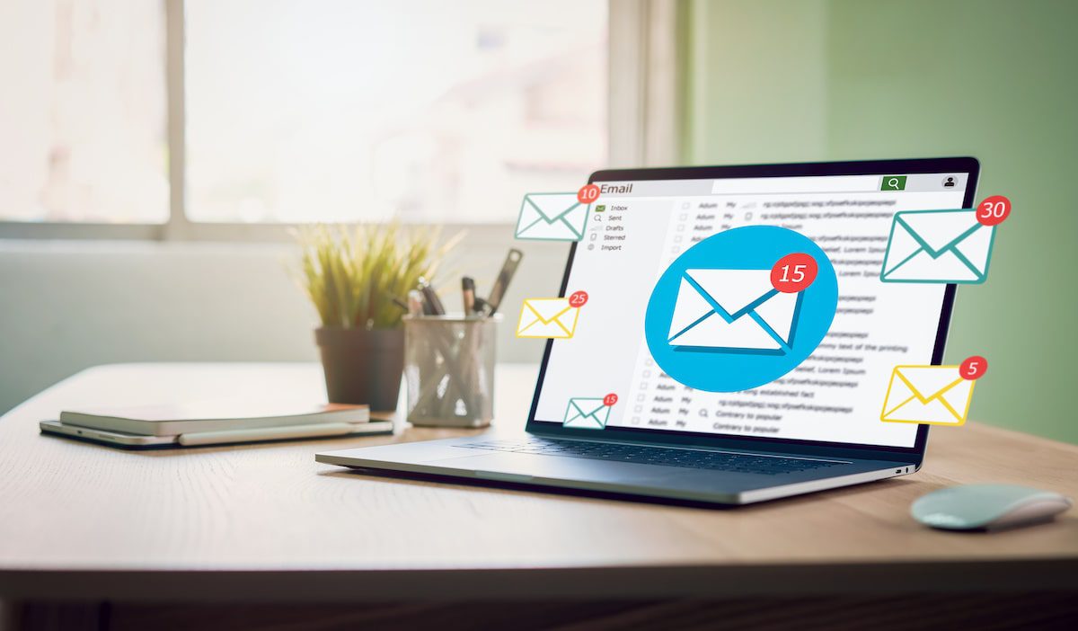 different email notifications on a laptop to signify different email marketing audiences